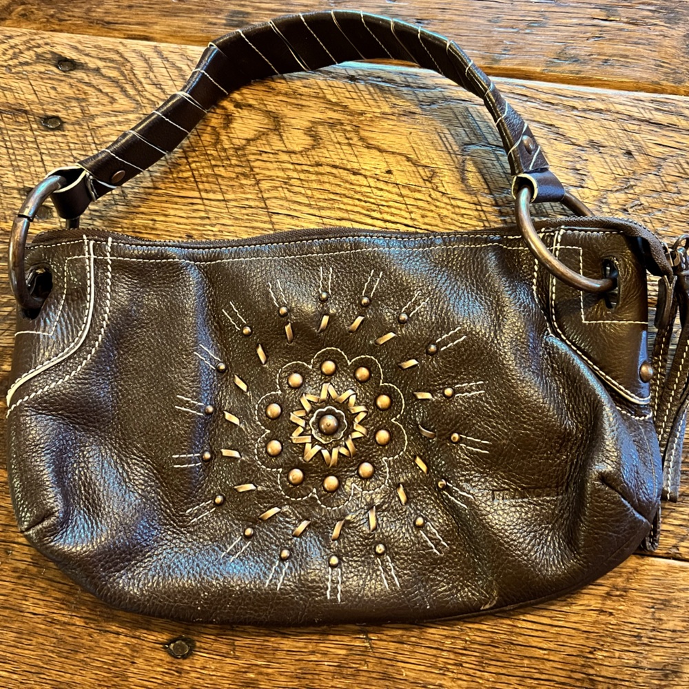 Pebble leather with decorative detailed front from Franco Sarto